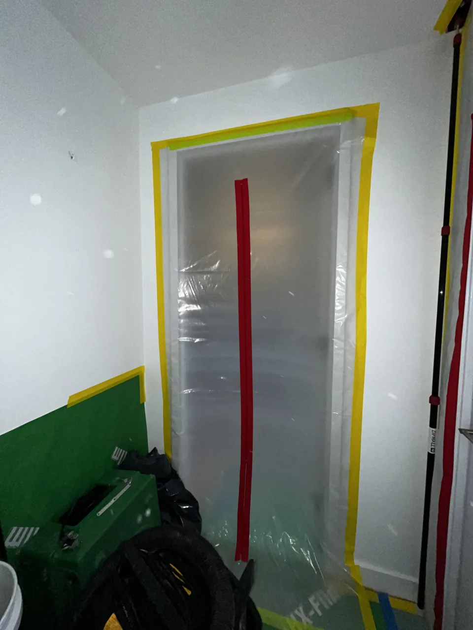 Zippered Containment Doorway NYC Mold Remediation & Water Mitigation | GreenRoom Remediation